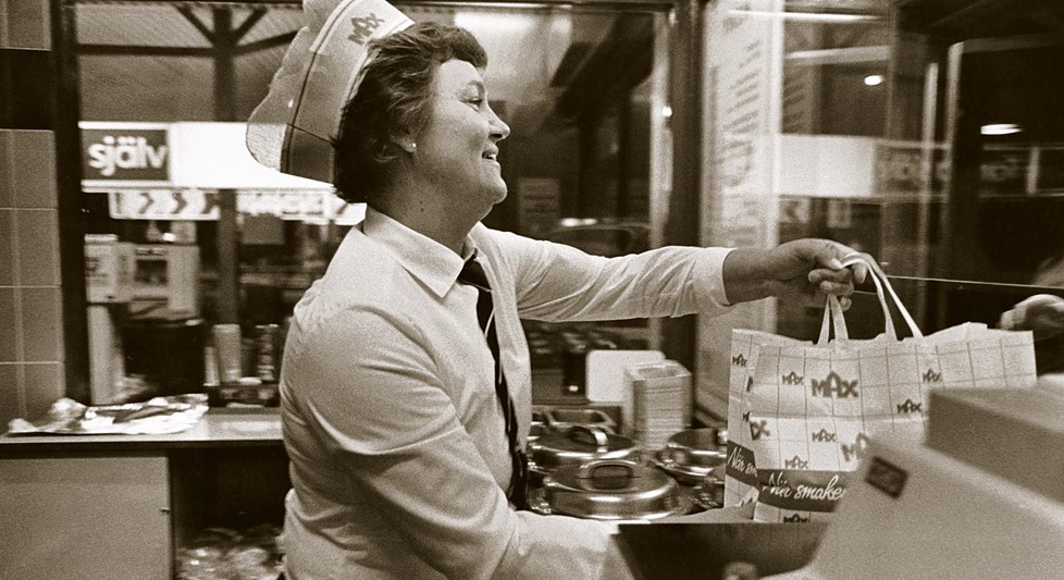 Retro image: staff handing over food